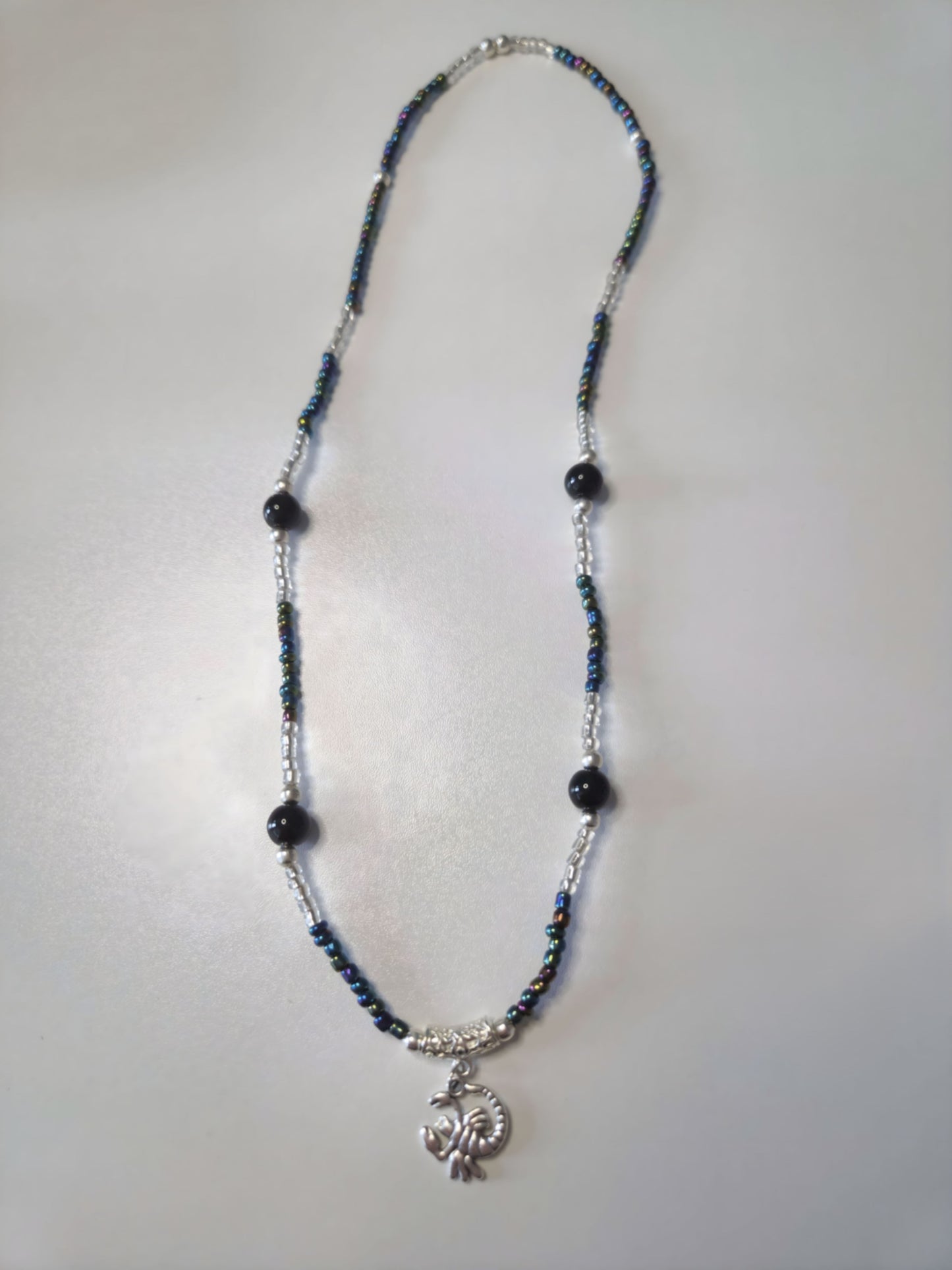 Beaded necklace with black obsidian and silver details