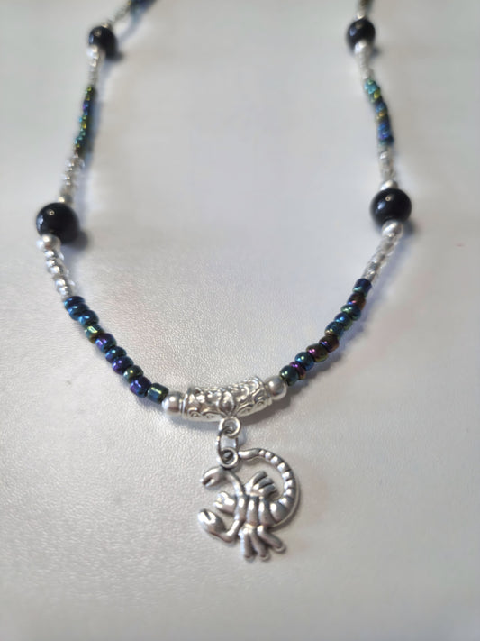 Beaded necklace with black obsidian and silver details