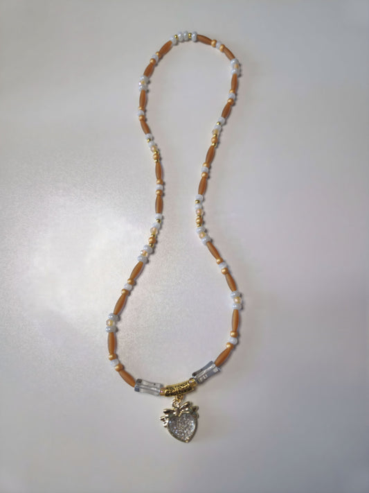 Beaded necklace in gold, brown and white
