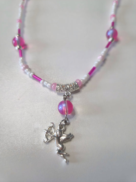 Beaded necklace with silver and pink details.